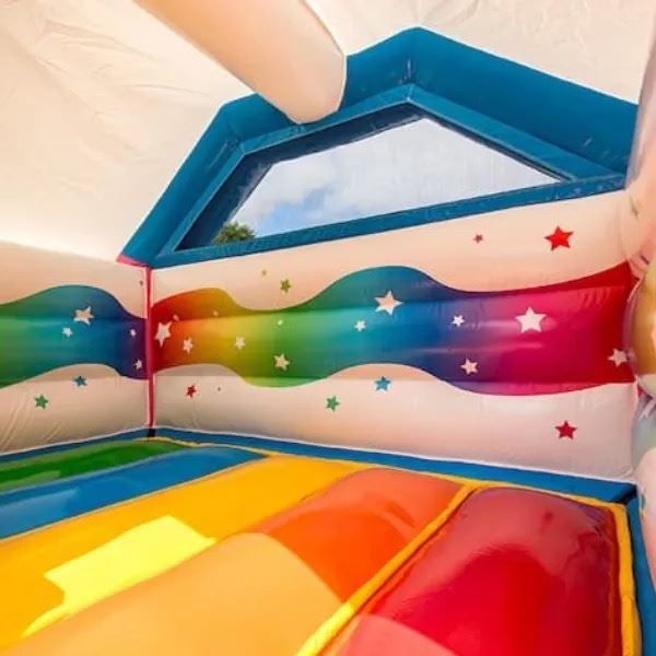 Springkussen Unicorn met glijbaan